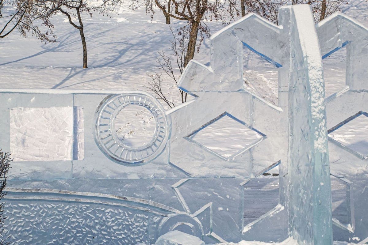 Carved ice sculpture lit at night