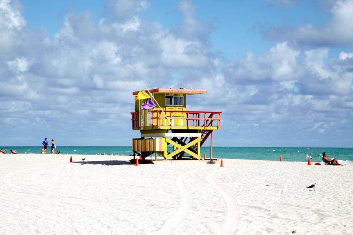 Colorful lifeguard tower on Miami Beach under a clear blue sky